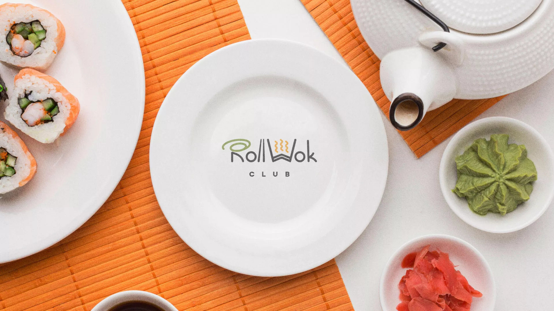 Разработка логотипа и фирменного стиля суши-бара «Roll Wok Club» в Сухиничах